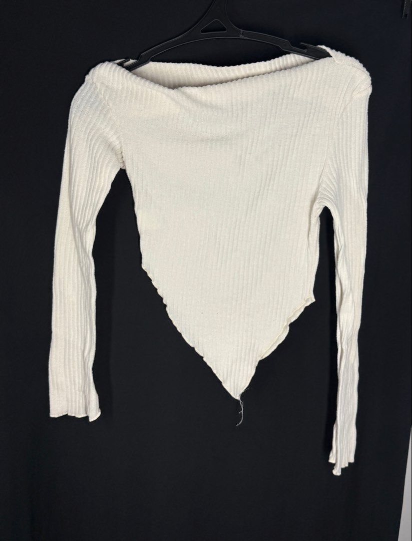 Cream Ribbed Asymmetrical Long Sleeve Top (Category: Longsleeves) located in Angeles City. Submitted by lesmiz24601 (Listing ID 1460973423, Image 2). Description: - Cream ribbed long-sleeve top - Asymmetrical hemline - Off-shoulder neckline - Stretchy material for a comfortable fit - Perfect for dressing up or down, looks great tucked in or worn out.