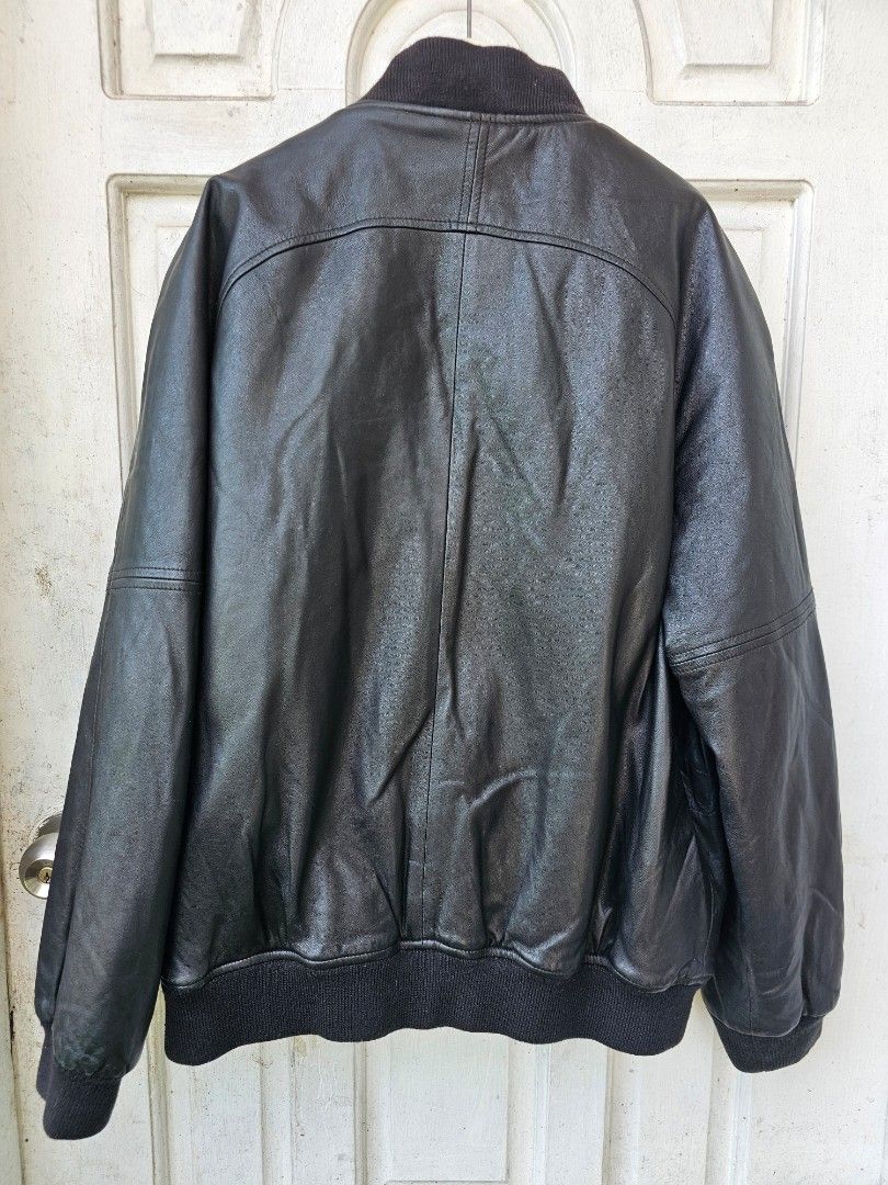 Crocodile Black Leather Bomber Jacket Size 50 (Category: Coats, Jackets and Outerwear) located in Tagbilaran City. Submitted by lugarpogi (Listing ID 1460960142, Image 3). Description: - Classic black leather bomber jacket - Brand: Crocodile - Material: Genuine Leather - Size: 50 - Features: Zip-up front, ribbed cuffs and hem, small embroidered logo on chest - Ideal for: Cooler weather - Condition: Please check photos for details.