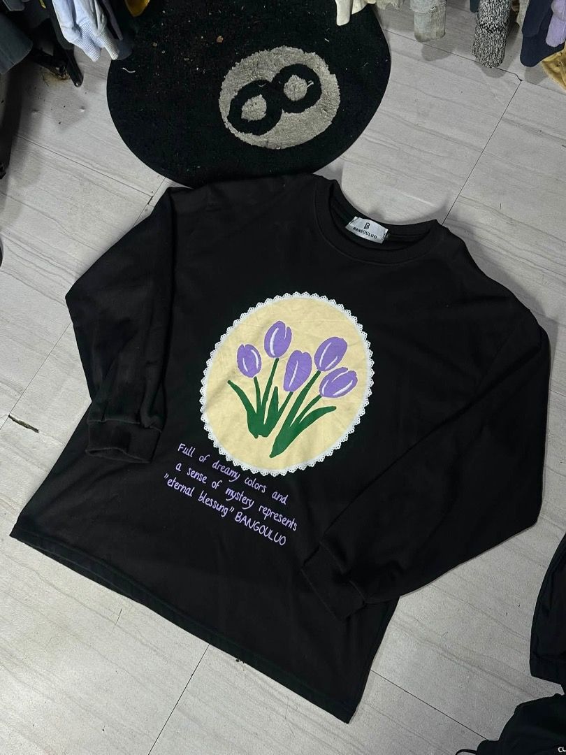 cute black tulips sweater (Category: Sleep and Loungewear) located in Manila. Submitted by nb_thriftshop (Listing ID 1461070348, Image 1). Description: 27.5 length 22 width medium to large no issue need wash height 5'5 weight 65 kg .