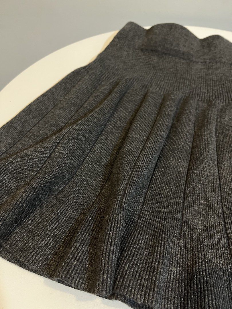 Dark Grey Pleated Knit Mini Skirt (Category: Skirts) located in Manila. Submitted by xoshushi.dcltr (Listing ID 1460975603, Image 3). Description: - Dark grey knit skirt - Pleated design all around - Ribbed and stretchy waistband - Mini skirt length - Easy to pair with various tops for different looks.