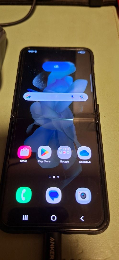 Defective Galaxy Z Flip4 (Category: Android Others) located in Quezon City. Submitted by kai-z_online (Listing ID 1393008535, Image 2). Description: Item is defective, find details below: 1. Screen has a green dot on upper portion of screen 2. Bottom half appears darker as seen on pics 2 and 3 3. Screen flickers when in use. 4. Black spot near the middle, right side of the screen. White line in middle screen. 5. Charger not included (USB C Charge
