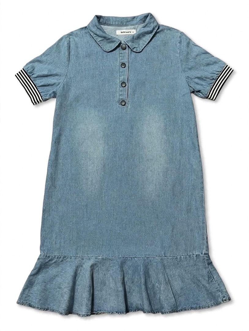 Denim Dress#55 (Category: Dresses) located in Caloocan City. Submitted by outfitloop (Listing ID 1460971573, Image 2). Description: - Adorable denim dress - Short sleeves with stylish black & white striped cuffs - Convenient button-up front - ruffled hem IMPORTANT: • 1st photo is an AI styling/model preview for reference on how the item may look when worn. • Please refer to the actual photos for the item’s true appearance and condition. • Color m