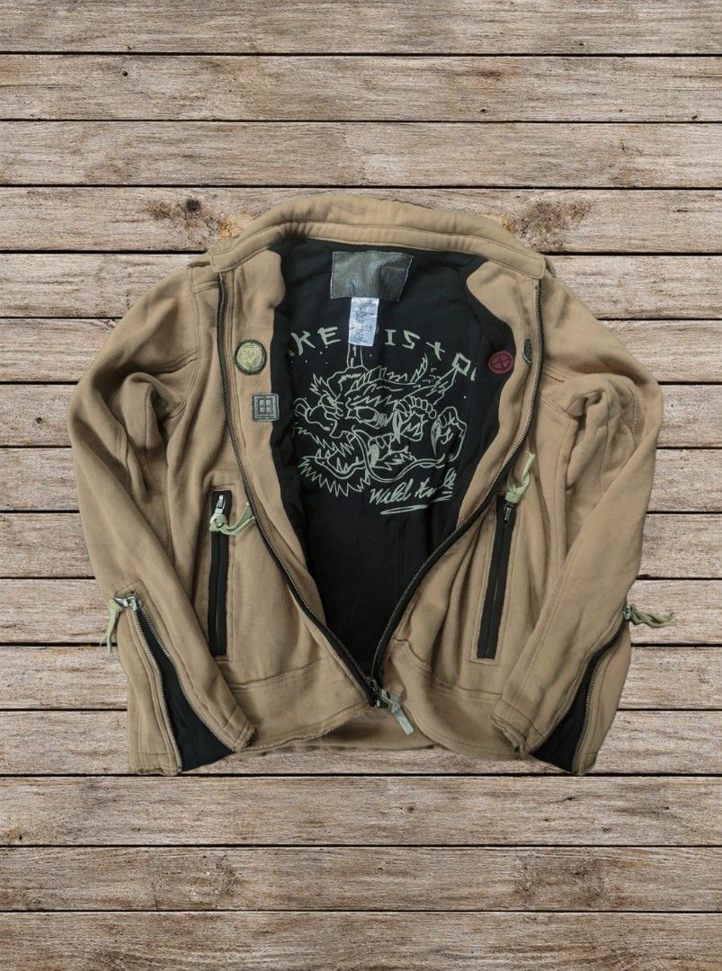 DIESEL JAPAN STYLE DISTRESSED JACKET (Category: Coats, Jackets and Outerwear) located in Tayug. Submitted by lowballer_2 (Listing ID 1461108377, Image 1). Description: DIESEL RISING SUNN Size L estimated dimes: 22x27 heavy asf complete tags Issue:stains double zip still negotiable .
