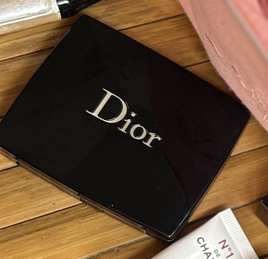 Dior Eyeshadow Palette (Category: Makeup) located in Manila. Submitted by declutterwithpeanut (Listing ID 1461107737, Image 1). Description: - Authentic Dior eyeshadow palette - Features three versatile shades - Comes with a convenient applicator - Sleek black compact case with an integrated mirror - Ideal for on-the-go touch-ups or everyday looks.