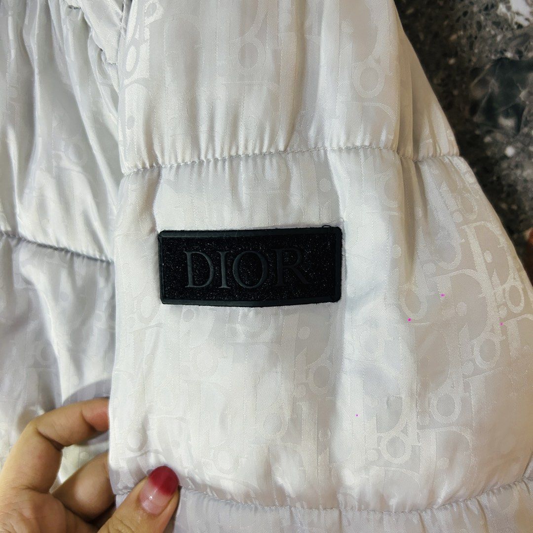 Dior puffer monogram jacket (Category: Luxury Apparel) located in Baguio. Submitted by kckc_luxury (Listing ID 1460945944, Image 3). Description: 🌸 TINY PINK SPOTS ARE LENS DAMAGE, NOT CLOTH STAINS ————————— ❗️KINDLY READ BEFORE MAKING AN OFFER❗️ LISTING DETAILS size:Large width x length (inches):26x30 condition: Good condition/not that puff anymore --- MOP: Gcash / BPI MOD: J&T / JRS LOCATION: Baguio City --- NOTE: • Manage your expectations • 