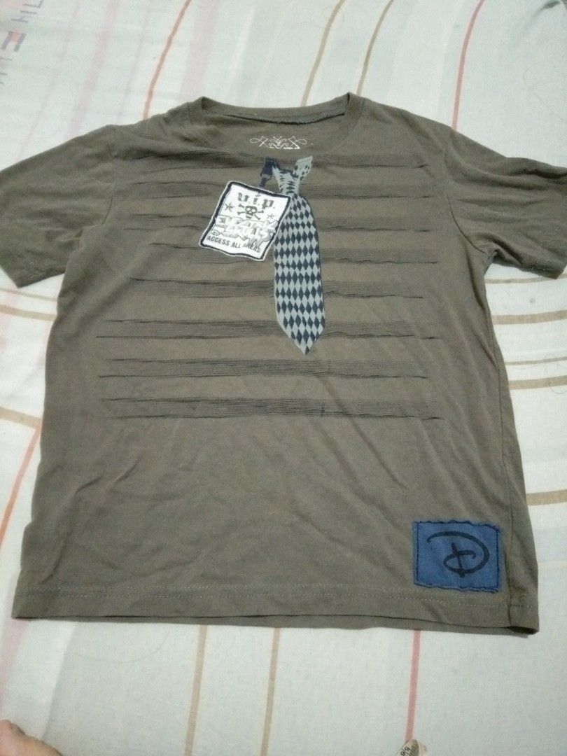 Disney shirt with tie design (Category: Babies & Kids Fashion) located in Quezon City. Submitted by eidorableshop (Listing ID 1461080675, Image 1). Description: .