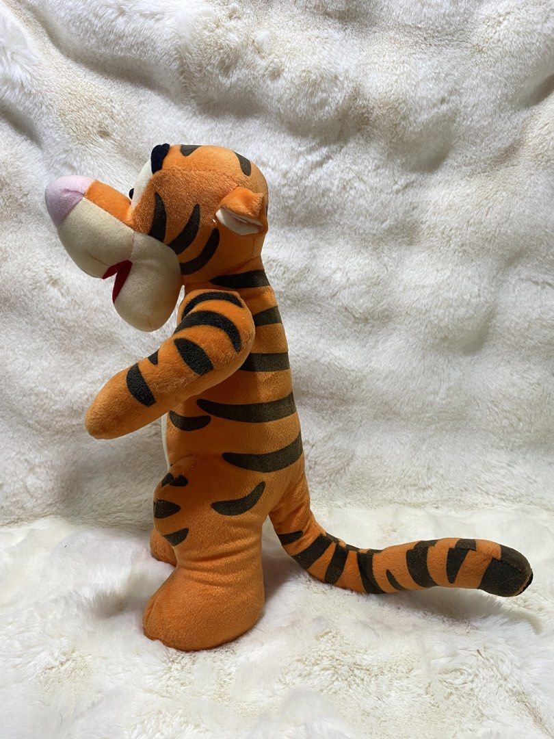 Disney Tigger Plush Toy (Category: Plushies & Soft Toys) located in Kalibo. Submitted by ollie_stuffshop (Listing ID 1460951173, Image 3). Description: 33cm x 17.5cm Before you send your inquiries: ❗️Last Price is already posted ❗️Manage your expectations, WYSIWYG ❗️May need washing ❗️Dropoff is every Wednesday & Sunday - Classic Tigger plush toy - Features iconic orange and black stripes - Stands upright on its own - Ideal for any Winnie the Poo
