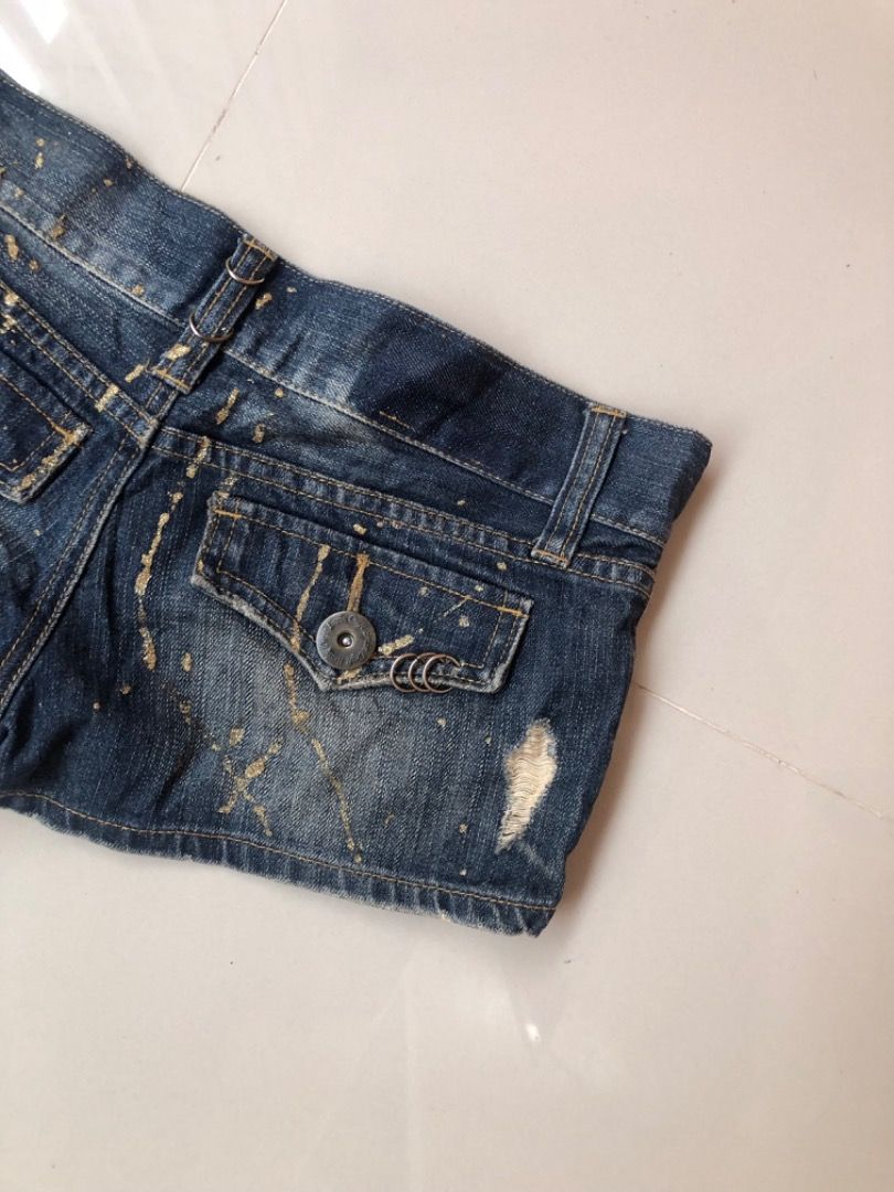 Distressed Denim Shorts with Paint Splatter (Category: Shorts) located in Davao. Submitted by christ07_fox (Listing ID 1461002345, Image 2). Description: - Unique blue denim shorts - Distressed details and paint splatter for a cool look - Secure button and zip closure - Functional front and back pockets - Belt loops for customization - Ideal for casual everyday wear.