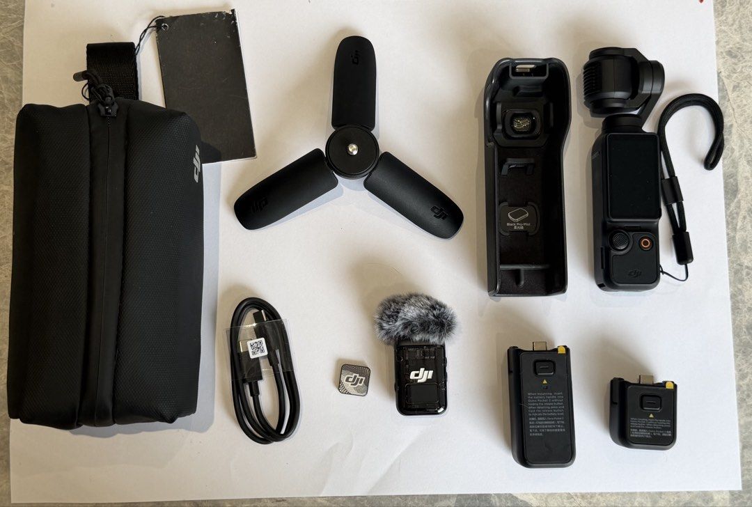 DJI Osmo Pocket 3 Creator Combo (Category: Cameras) located in Balagtas. Submitted by kkramos08 (Listing ID 1460990861, Image 1). Description: - DJI Osmo Pocket 3 Creator Combo - Includes camera, protective case, mini tripod, charging cable, and microphone - Comes with wide-angle lens attachment - Charging handle included - All accessories pictured are included - Original box present RFS: decluttering Can do meetups in Balagtas, Bulacan or Makati