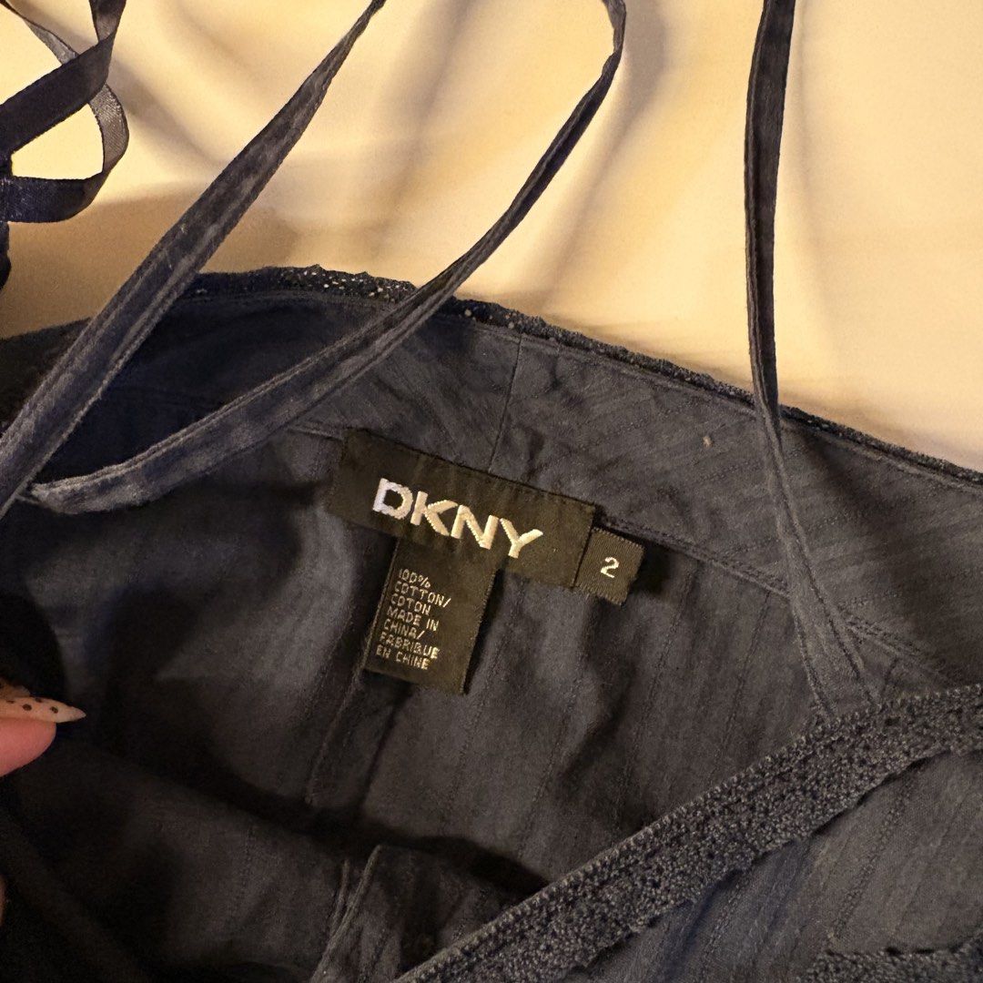 DKNY 100% Cotton button down Top (Category: Sleeveless) located in Quezon City. Submitted by kaelian_couture (Listing ID 1461035077, Image 3). Description: My hard to let go top It’s pretty when u just do 3 button it will look baby doll top.