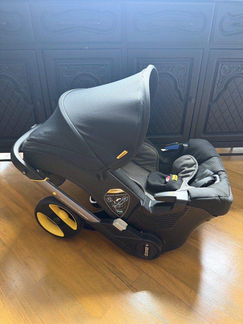 Doona+ Infant Car Seat Stroller (Category: Strollers) located in Makati City. Submitted by mslitp (Listing ID 1460946743, Image 2). Description: - Doona+ infant car seat that converts into a stroller - Color: Black and Grey - Effortless transition for travel and daily errands - Smooth folding wheels - Integrated canopy for sun protection - Designed for on-the-go parents - Box Available SRP : P26,999.