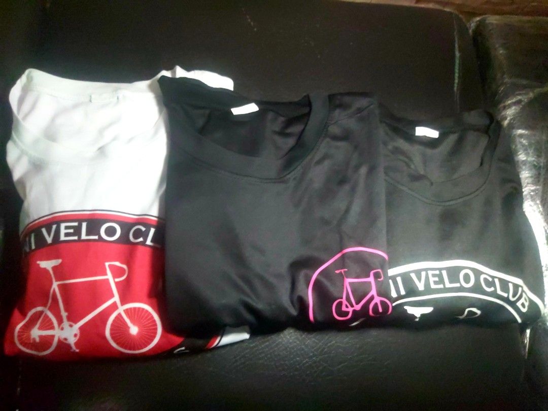 Drifit Cycling Shirt (Minivelo) (Category: Activewear) located in Manila. Submitted by tholihtzcuizon (Listing ID 1461031625, Image 1). Description: -Min Velo Club Logo T-shirts for cycling enthusiasts - Available Colors: White (with red & black design), Black (with pink design), Black (with white design) - Comfortable and stylish fit - Perfect for your next ride or casual wear -Drifit cloth material used but in prestine condition size 2xl no iss