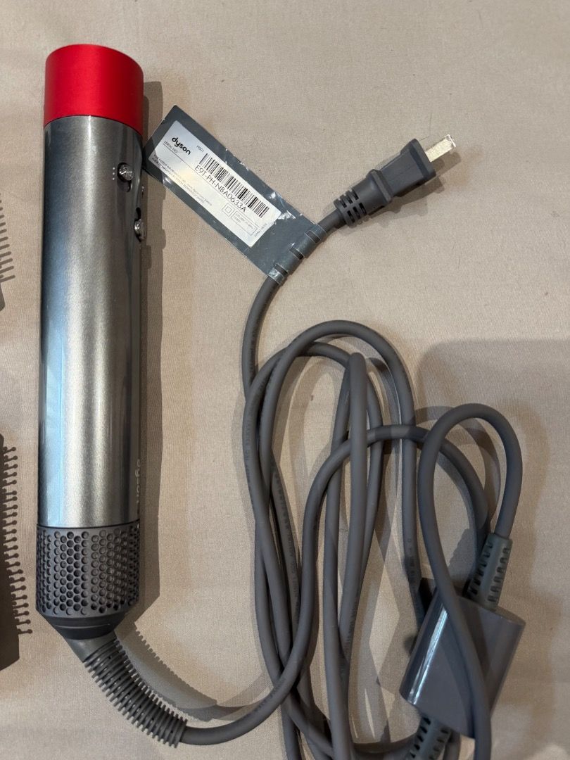 Dyson Airwrap First-Gen (Red Nickel) (Category: Hair) located in Las Pinas. Submitted by kayebombita (Listing ID 1460944828, Image 3). Description: RFS: bought a new one.