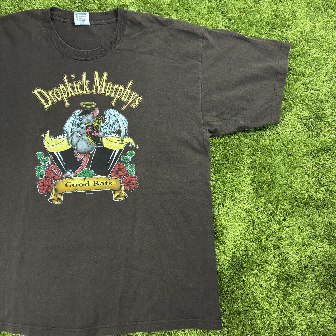 Early 2000’s “Dropkick Murphys” Band Tee (Category: Tshirts & Polo Shirts ) located in Lucena. Submitted by shopdotmane (Listing ID 1461070292, Image 2). Description: Early 2000’s Dropkick Murphys Band Tee Size 2XL on tag 25 (width) x 31.5 (length) Still in good condition .