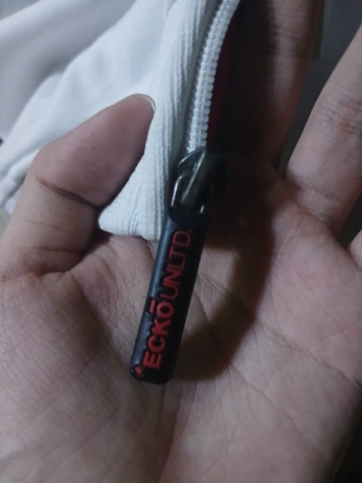 Ecko Unltd Rhino Graffiti Track Jacket (Category: Coats, Jackets and Outerwear) located in Cabuyao City. Submitted by odddolphin-aa30 (Listing ID 1461042787, Image 3). Description: 22-24 X 30 Black stain at ribbings Lints Sign of blue pen stain .