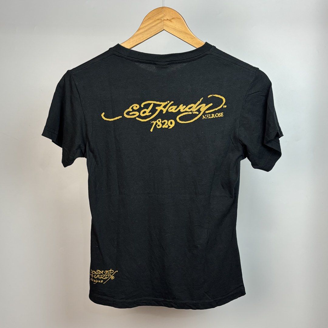 Ed Hardy Eagle & Flag Graphic T-Shirt Size M (Category: Shirts) located in Santa Maria. Submitted by dazzle_thrifts (Listing ID 1461015981, Image 2). Description: Excellent condition Flaws: none Size: S-M Width: 16 Length: 20 .