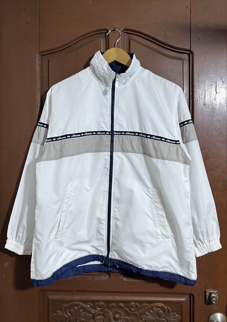 Ellesse White Tape Design Windbreaker (Category: Coats, Jackets and Outerwear) located in Manila. Submitted by thriftpoint99 (Listing ID 1461075402, Image 1). Description: 22.5x26.5 No issue Need wash only Excellent condition.