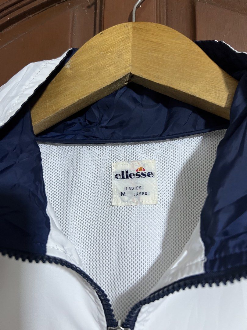 Ellesse White Tape Design Windbreaker (Category: Coats, Jackets and Outerwear) located in Manila. Submitted by thriftpoint99 (Listing ID 1461075402, Image 2). Description: 22.5x26.5 No issue Need wash only Excellent condition.
