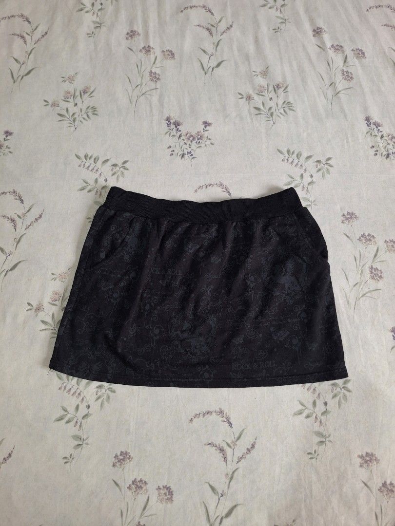 Emo alt punk graphic pull-on skirt // plus size (Category: Other Bottoms) located in Taguig. Submitted by butterflypea.thrift (Listing ID 1460975119, Image 1). Description: - size: xxl on tag, waist - 30, length - 14 - Stylish black pants with a unique dark grey all-over pattern. - Pattern features butterflies, roses, and ornate designs. - Comfortable elastic waistband. - Includes convenient pockets. - Ideal for casual wear..