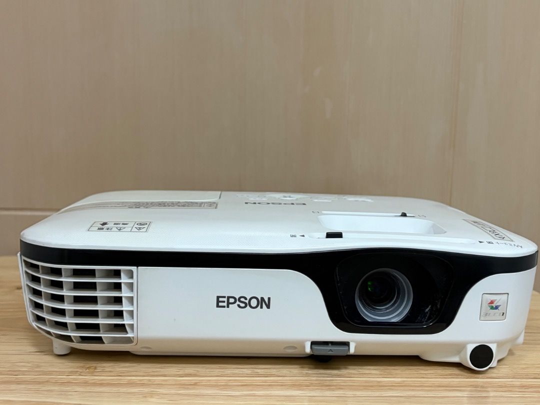 EPSON EB-S12 H430D Projector (USED) (Category: Projectors) located in Caloocan City. Submitted by paulmarting (Listing ID 1461027017, Image 1). Description: Epson EB-S12 H430D Projector Pre-owned and in working condition. Lamp Hours: • Normal Mode: 1,215 H • ECO Mode: 189 H Condition / Remarks: • Cosmetic scratches • Sticker residue/stains • Dirt and signs of use • Please see photos for the actual condition Included: Power cord VGA cable Carrying