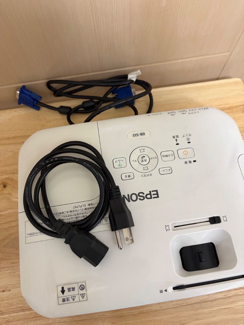 EPSON EB-S12 H430D Projector (USED) (Category: Projectors) located in Caloocan City. Submitted by paulmarting (Listing ID 1461027017, Image 2). Description: Epson EB-S12 H430D Projector Pre-owned and in working condition. Lamp Hours: • Normal Mode: 1,215 H • ECO Mode: 189 H Condition / Remarks: • Cosmetic scratches • Sticker residue/stains • Dirt and signs of use • Please see photos for the actual condition Included: Power cord VGA cable Carrying