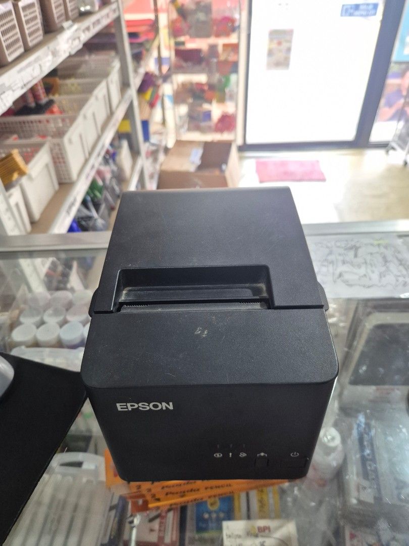 Epson Receipt Printer TM-T88V (Category: Printers, Scanners & Copiers) located in Cavite. Submitted by luxuryu030 (Listing ID 1461114948, Image 1). Description: - Epson TM-T82X POS Printer - Color: Black - Condition: Works well, tested and ready to use - Ideal for: Retail and restaurant businesses - What's included: Printer unit only - What's NOT included: Power adapter.