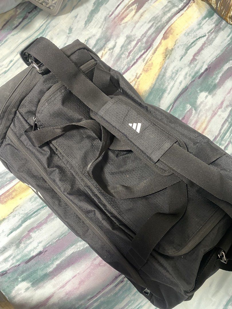 Essential 3 Stripes Duffel Bag (Category: Sling Bags) located in Pasig City. Submitted by theseanborjal (Listing ID 1461059887, Image 1). Description: -Authentic - in really good condition - Size small.