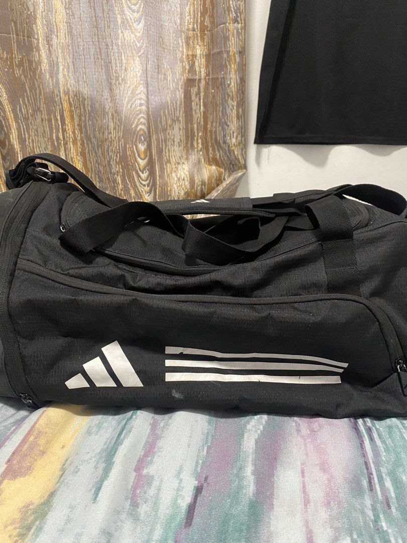 Essential 3 Stripes Duffel Bag (Category: Sling Bags) located in Pasig City. Submitted by theseanborjal (Listing ID 1461059887, Image 2). Description: -Authentic - in really good condition - Size small.