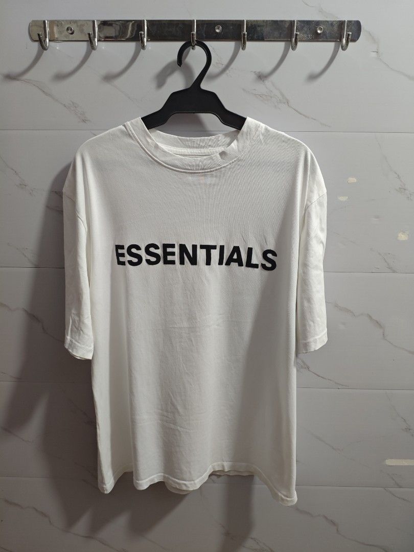 Essentials White Classic Men Tshirt (Category: Everything Else Others) located in Baguio. Submitted by jayjay_apparel01 (Listing ID 1461046257, Image 1). Description: Essentials White Classic Men Tshirt Color Rate 9.5/10 Like New Complete Tags Off Lang Makapal Tela Cotton Machine Washed Size XL Dimes 23 Width 28 Length Price P249.