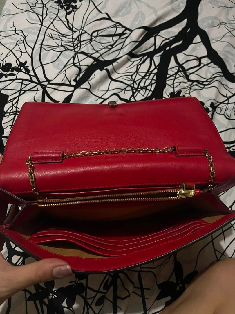 Euc Rare McM Rockstud Leather Crossbody Bag (Category: Luxury Bags & Wallets) located in Infanta. Submitted by izzy2shop (Listing ID 1461107151, Image 2). Description: Mcm Red Crocs skin embossed studded cluctch/envelope it has Studded border, front MCM plaque/logo, Envelope-style flap and it has original strap and has authenticity details..