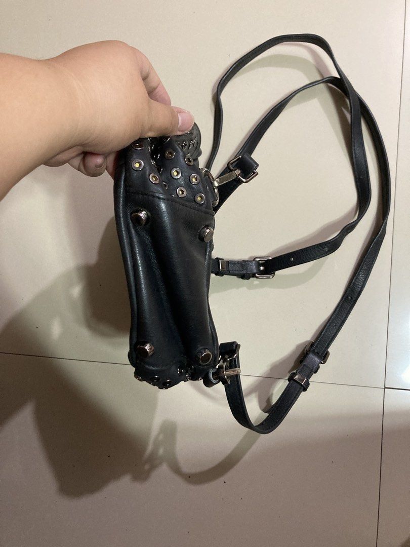 Euro-col Black Leather Studded Mini Backpack (Category: Backpacks) located in Manila. Submitted by abengjoy30 (Listing ID 1461069337, Image 3). Description: - Black leather mini backpack from Euro-col - All-over silver stud details - Adjustable straps for comfort - Convenient zippered compartment at the back - Branded tag inside - Compact and ideal for carrying essentials.