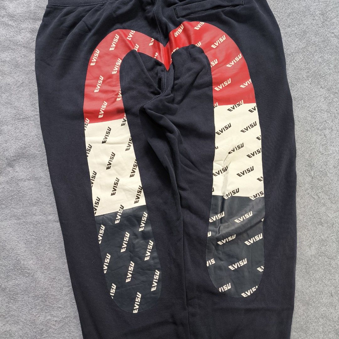 Evisu Daicock Jogger Pants (Category: Joggers) located in Manila. Submitted by shykes_26 (Listing ID 1460969197, Image 3). Description: Dimensions: Waist - 36-44 (XL on tag) Length - 37 Thigh - 13 Leg open - 5 Issues: Scratch (lace hole), minor fade.
