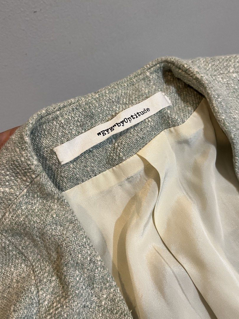 EYE by Optitude Tweed Blazer (Category: Coats, Jackets and Outerwear) located in Manila. Submitted by xoshushi.dcltr (Listing ID 1460974042, Image 3). Description: - Light grey tweed fabric - Single button front closure - Cream-colored satin lining - Padded shoulders - Perfect for dressing up or down.