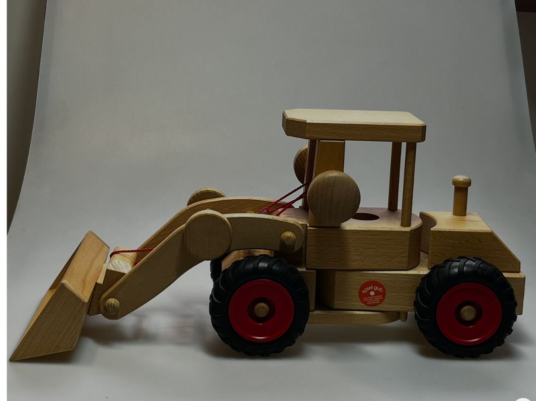 Fagus Wheel Loader (Category: Kids Toys) located in San Juan City. Submitted by protoolsmnl (Listing ID 1460933121, Image 2). Description: - Wooden toy truck with front loader - Detachable trailer - Rubber wheels with red rims - Made from natural wood - Ideal for imaginative play.