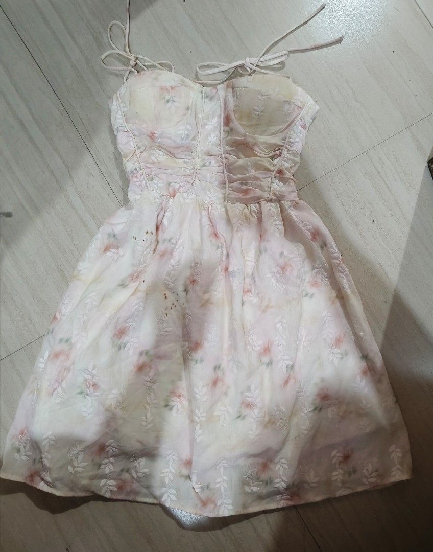 Fairy Dress (Category: Dresses) located in Taguig. Submitted by Elyyyy (Listing ID 1461081062, Image 1). Description: - Sweet floral print dress - Corset style bodice with tie-up straps - Flowy skirt with delicate leaf pattern - Ideal for summer days or casual events.
