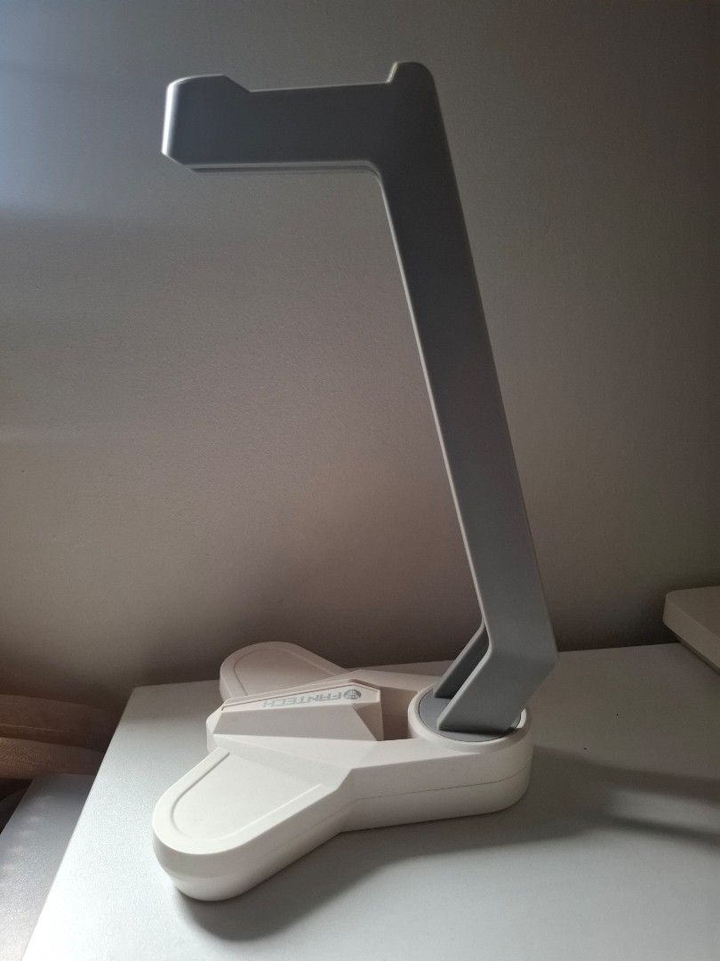 Fantech Gaming Headphone Stand (Category: Headphones & Headsets) located in Quezon City. Submitted by camiscloset_ (Listing ID 1460968848, Image 3). Description: FANTECH HEADSET TOWER STAND Color: White and Grey Size: 26.5cmx15cmx14cm Anti Slip Design Rubberized Base Added Weights Inside for Balance Stabilization Triangular Base Design By Fantech Condition: Good condition as this was rarely used.