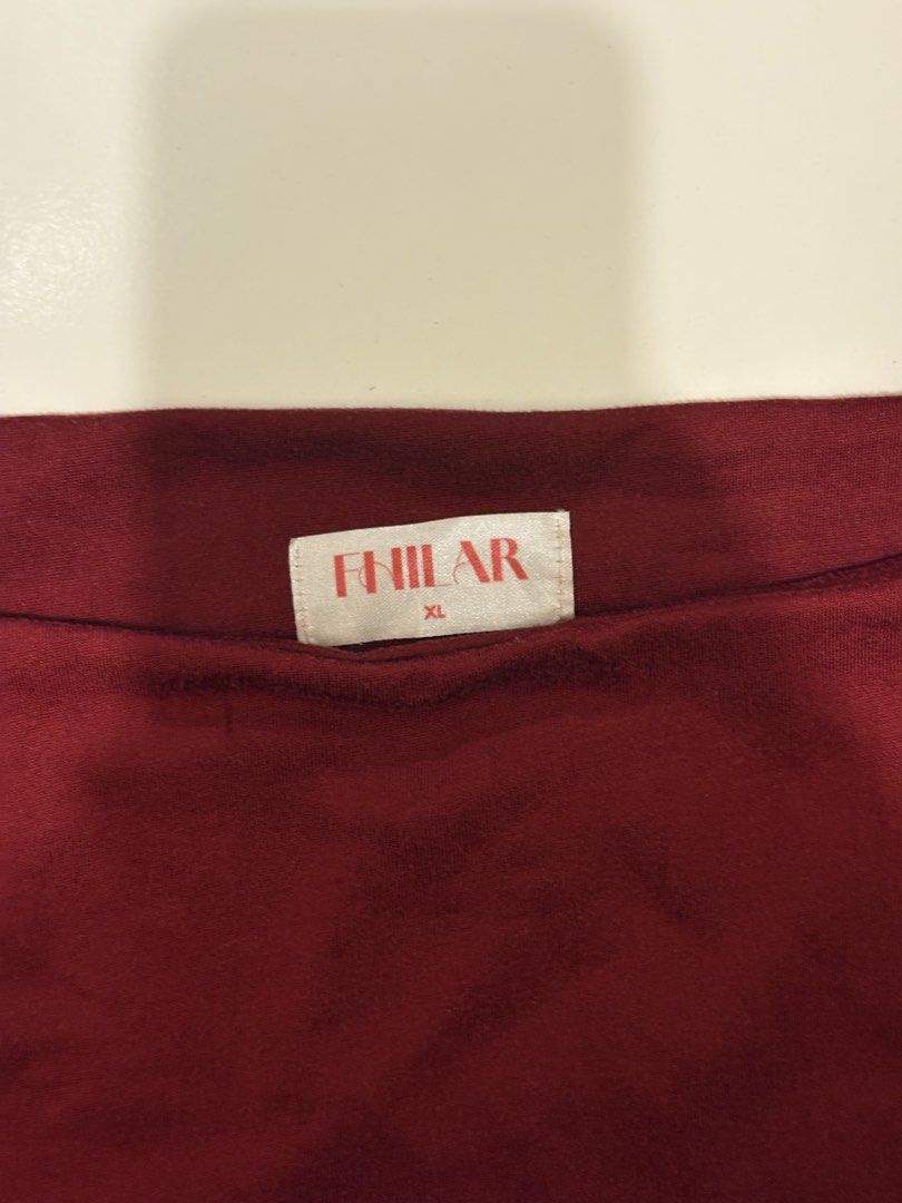 Fhilar Maroon Tank Top in extra large (Category: Sleeveless) located in Imus. Submitted by the_preloved_garage (Listing ID 1461072901, Image 3). Description: - size: extra large - barely used - sf should be shouldered by the buyer - has minor flaws NO COD.