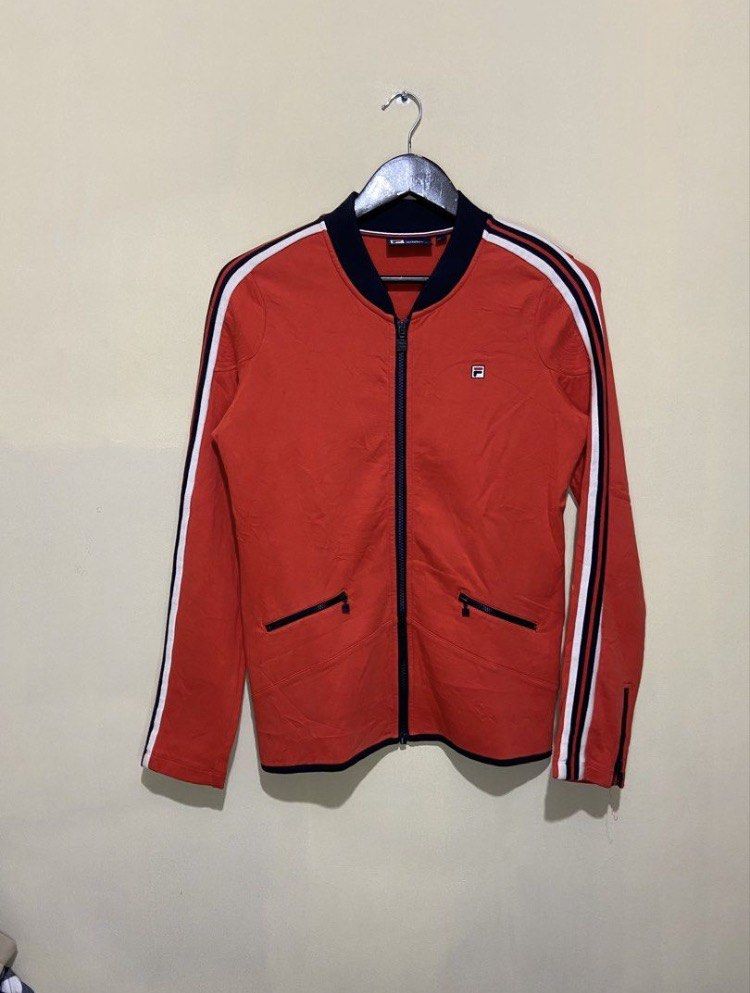 FILA FULL ZIP-UP DARK ORANGE TRACK JACKET (Category: Coats, Jackets and Outerwear) located in Cavite. Submitted by seppp22 (Listing ID 1461022626, Image 3). Description: Authentic Legit Size:M-L Dimes:19x24.5 Color Rate:9.8/10 Condition:Good condition Mine for Only:159 Pesos Full Zipped With 2 Front Zipper Pocket Can ship Luzon,Visayas, And Mindanao Thru J&T, Payment First(Gcash) Lalamove(Cod/Gcash) Meetup My Location:Lancaster,General Trias,Cavi