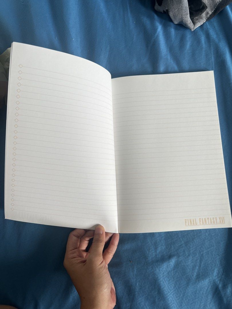 Final Fantasy XVI Square Enix Notebook (Category: Stationery & School Supplies) located in Manila. Submitted by binigurrl (Listing ID 1460927591, Image 2). Description: - Official Final Fantasy XVI notebook - Features iconic game artwork on the cover - Lined pages inside for notes and ideas - Perfect for Final Fantasy fans - Ideal for journaling or as a collectible.