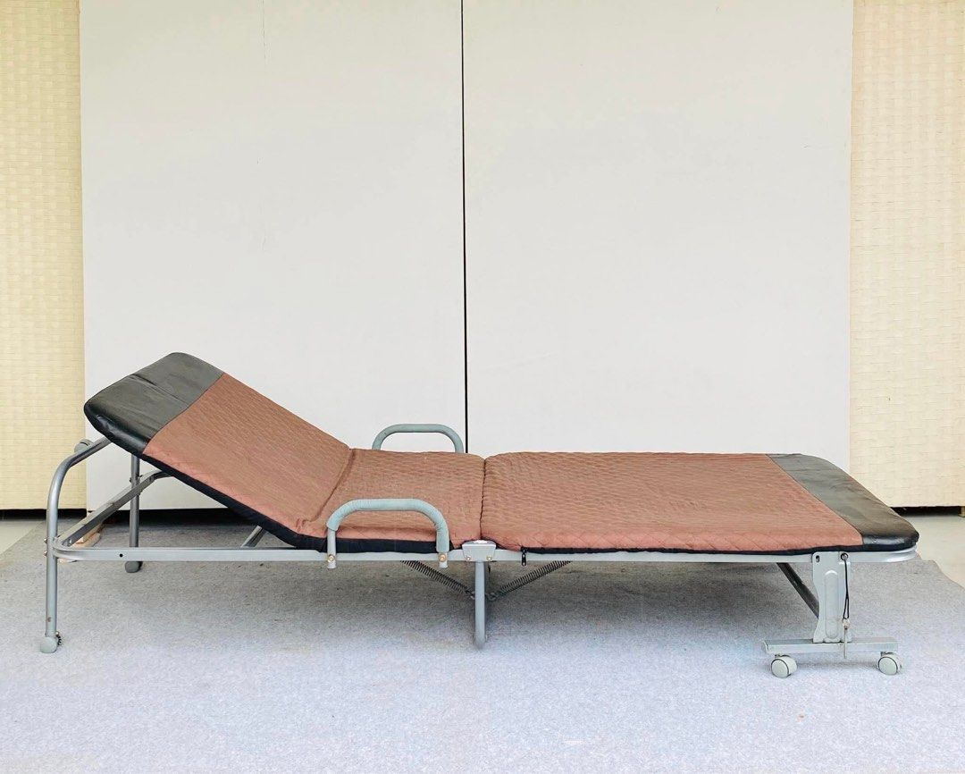 FOLDING & MANUAL RECLINING BED (Category: Bed Frames & Mattresses) located in Manila. Submitted by jerichocal17856 (Listing ID 1460963929, Image 1). Description: “JAPAN SURPLUS” FOLDING & MANUAL RECLINING BED SIZE: 80L” x 36W” x 12H” inches (AS-IS ITEM) IN GOOD CONDITION.
