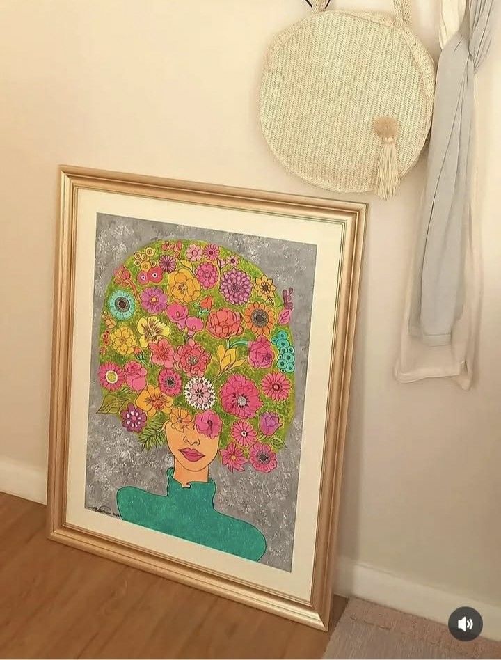 Framed painting (Category: Frames & Pictures) located in Manila. Submitted by jesuschrist1 (Listing ID 1461091279, Image 1). Description: - Framed painting with a vibrant floral hair design. - Features a portrait with an intricate flower arrangement. - Set against a textured gray background. - Encased in a stylish gold-tone frame. - Perfect for home decor and adding artistic flair. - Ready to be displayed..