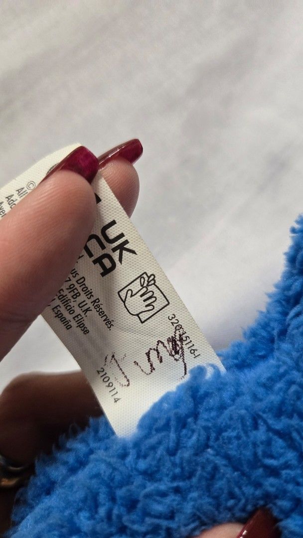 FUGGLER - Blue Gaptooth Mcgoo (Category: Plushies & Soft Toys) located in Manila. Submitted by fierceriver.e57033 (Listing ID 1460953334, Image 3). Description: - No box, with pen marks on tag. - Adorable blue plush toy, approximately 9 inches in length. - Features big, fun googly eyes and a row of cute teeth. - Made from super soft and fuzzy material for a cuddly feel. - Includes a small button detail on the back. - Ideal for children's playtime