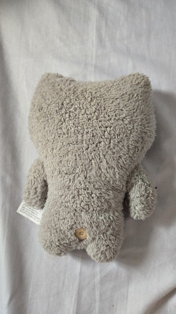 FUGGLER - Gray Munch Munch (Category: Plushies & Soft Toys) located in Manila. Submitted by fierceriver.e57033 (Listing ID 1460953992, Image 2). Description: - No box, tag intact - Adorable and quirky plush toy - Fuzzy grey exterior - Realistic teeth and detailed eyes - Approximately 9 inches long - Small button on the back - Ideal for collectors or as a unique gift.