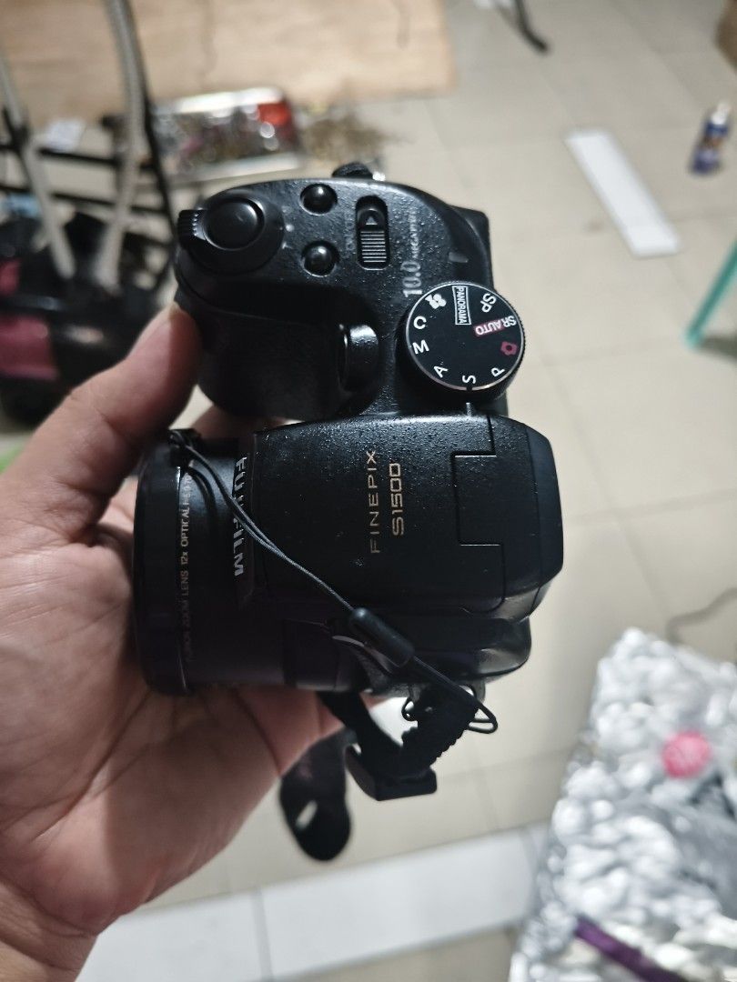 Fujifilm FinePix S1500 10.0MP Digital Camera (Category: Cameras) located in Quezon City. Submitted by anitagalan89774 (Listing ID 1460952907, Image 1). Description: - Fujifilm FinePix S1500 Digital Camera - 10.0 Megapixels for clear shots - 12x Optical Zoom with Image Stabilization - Uses convenient AA batteries - Includes original box - Ideal for everyday photography issue battery sd card no sample shot black screen.