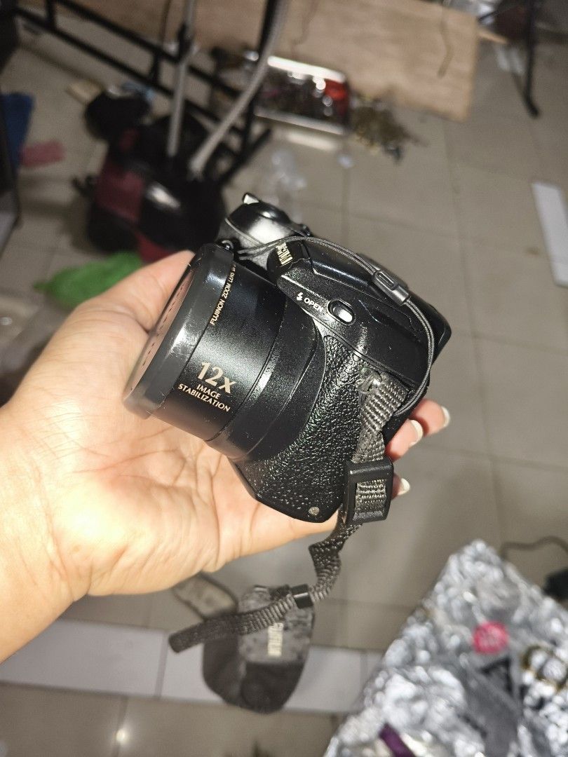 Fujifilm FinePix S1500 10.0MP Digital Camera (Category: Cameras) located in Quezon City. Submitted by anitagalan89774 (Listing ID 1460952907, Image 2). Description: - Fujifilm FinePix S1500 Digital Camera - 10.0 Megapixels for clear shots - 12x Optical Zoom with Image Stabilization - Uses convenient AA batteries - Includes original box - Ideal for everyday photography issue battery sd card no sample shot black screen.