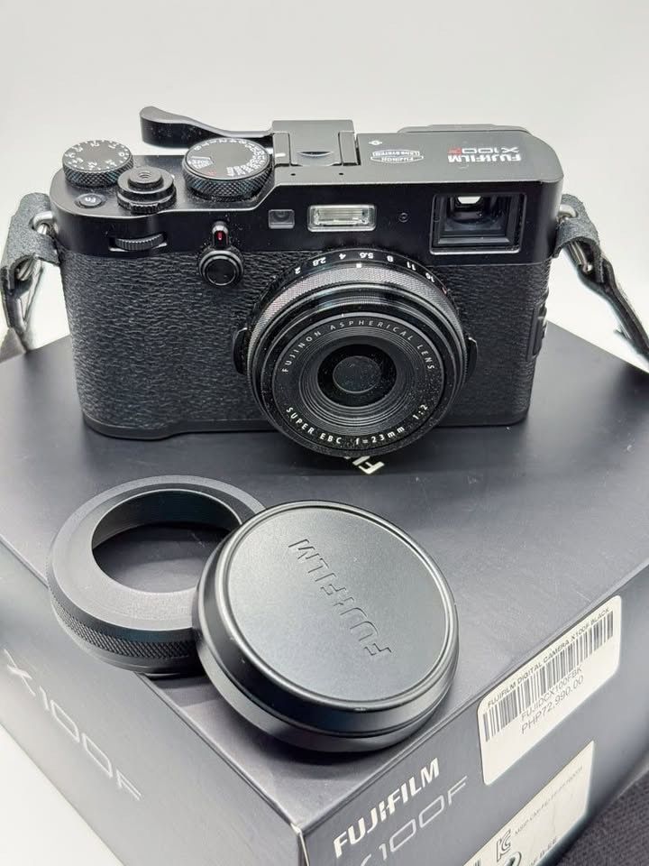 Fujifilm X100f Black (Category: Cameras) located in Cabuyao City. Submitted by croghp (Listing ID 1460943852, Image 2). Description: Premium compact camera featuring 24.3MP APSC X-Trans CMOS III sensor Fixed 23 f2.0 lens (35mm equivalent) Classic Rangefinder Style Design Hybrid electronic viewfinder Excellent Image Quality Very lightly used with 2,700 shutter count With inverted hood and original Fuji lens cap With box and papers, original batter