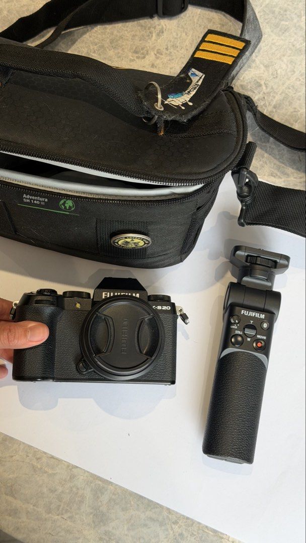 Fujifilm X-S20 Mirrorless Camera with Grip and Bag (Category: Cameras) located in Balagtas. Submitted by kkramos08 (Listing ID 1460993036, Image 3). Description: - Fujifilm XS-20 Mirrorless Camera - Includes 15-45mm Lens - Comes with Fujifilm Grip for enhanced handling - Black Camera Bag included (bag shows some wear but is fully functional) - Camera body is clean and well-maintained - Perfect for photography enthusiasts looking for a versatile s