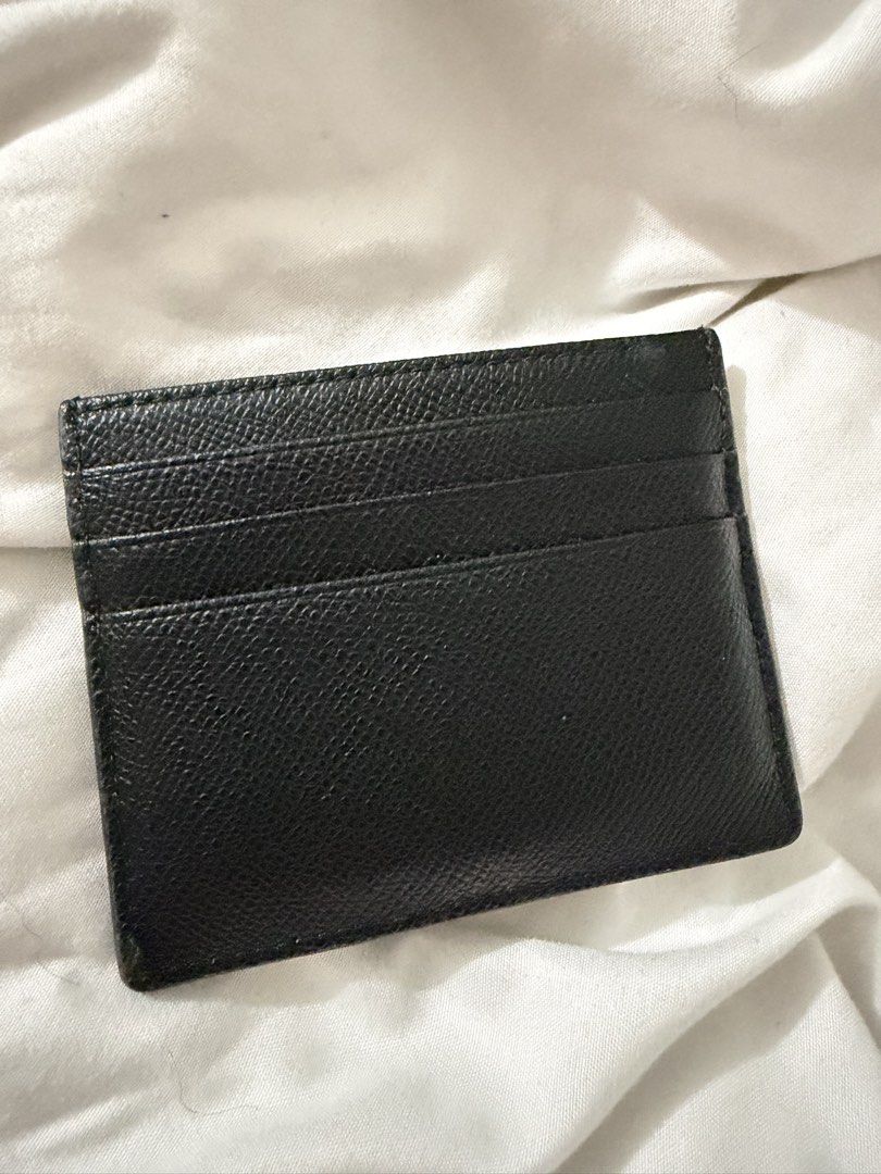 Furla Black Leather Cardholder (Category: Wallets & Card holders) located in Quezon City. Submitted by jdmc16 (Listing ID 1461045577, Image 3). Description: - Genuine Furla black leather cardholder - Textured leather finish for a sophisticated look - Multiple card slots to keep your essentials organized - Simple and classic design, perfect for everyday use - Compact size, fits easily in pockets or small bags - With dustbag, tag, and box.