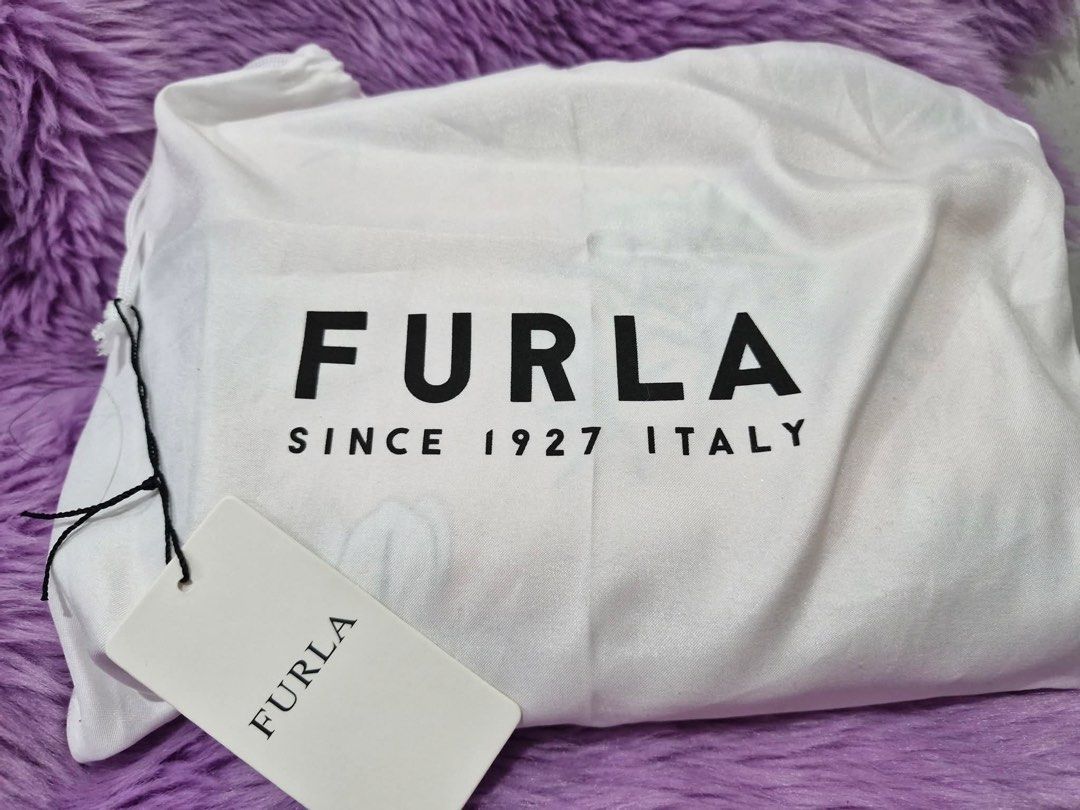 Furls Bag/Pouch (Category: Wallets & Card holders) located in Manila. Submitted by mikaiimouse (Listing ID 1460946140, Image 1). Description: FURLA Bag/ Pouch ◇with Tags and dustbag Size : 10 inches × 6.5 inches ♡PRICE IS VERY MUCH NEGOTIABLE ☆ONLINE PAYMENT ¤ Delivery Via Lalamove or LBC shouldered by customer * Meet up - only for residents or near Malolos City, Bulacan.