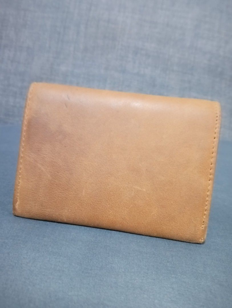 Genuine Leather Card Holder (Category: Wallets & Card holders) located in Hermosa. Submitted by chic2315 (Listing ID 1461031538, Image 2). Description: Brown genuine leather card holder. Unisex. Made of cow leather and hindi bakbakin ang leather. Can store cash and cards. Rfs: Decluttering .